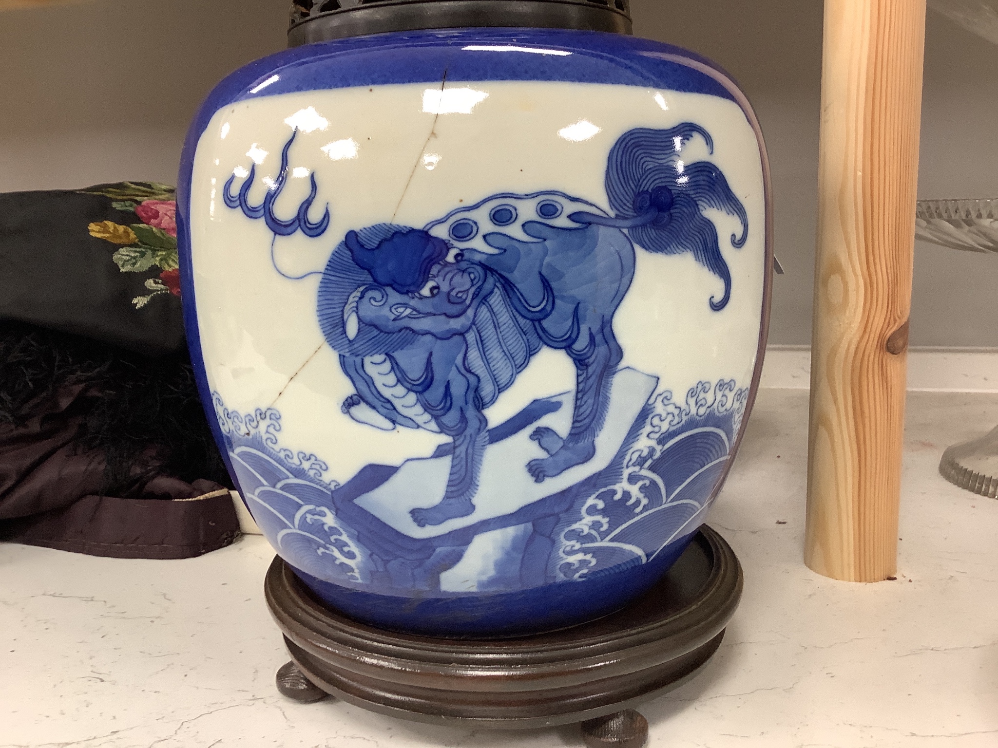 A pair of 19th century Chinese blue and white 'mythical beast' jars